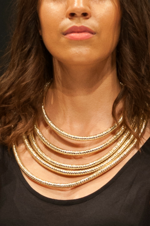 Close up of woman posing with the Gold Rope Necklace